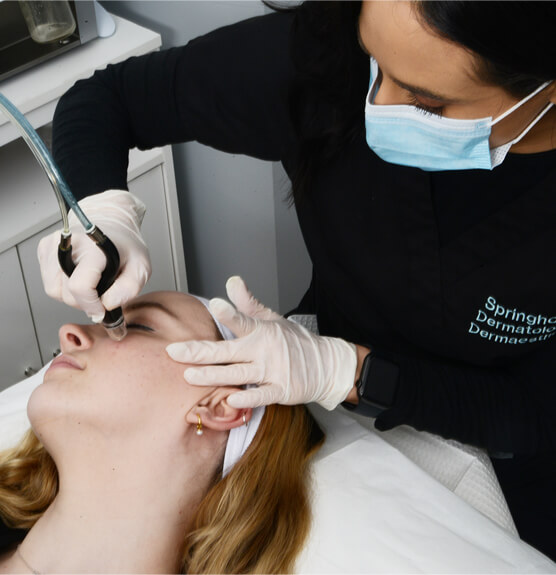 Female patient at the procedure - Acne Prone