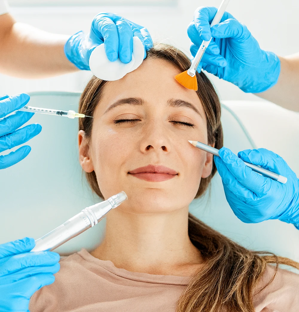 Cosmetic dermatology: A woman receiving multiple non-surgical facial treatments including botox and microneedling for facial rejuvenation.