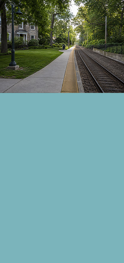 Find The Best Dermatologist near Penllyn: Tree-lined train platform in Penllyn Find The Best Dermatologist near Penllyn Banner