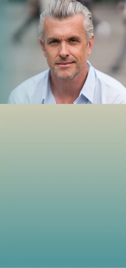 Man with gray hair in a portrait for hair loss treatment. Hair Loss Treatment in Philadelphia & Montgomery County  Banner